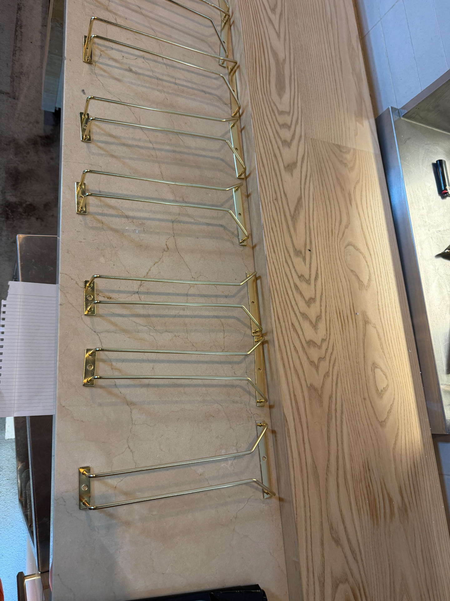 Sixteen Brushed Brass-Finish Under-Shelf Stemware Racks — Complete Set of 16